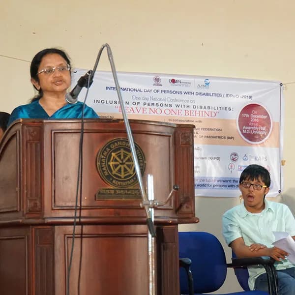 A speaker addresses the audience