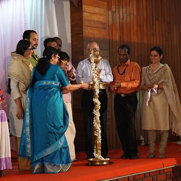 Lighting the lamp at the inauguration