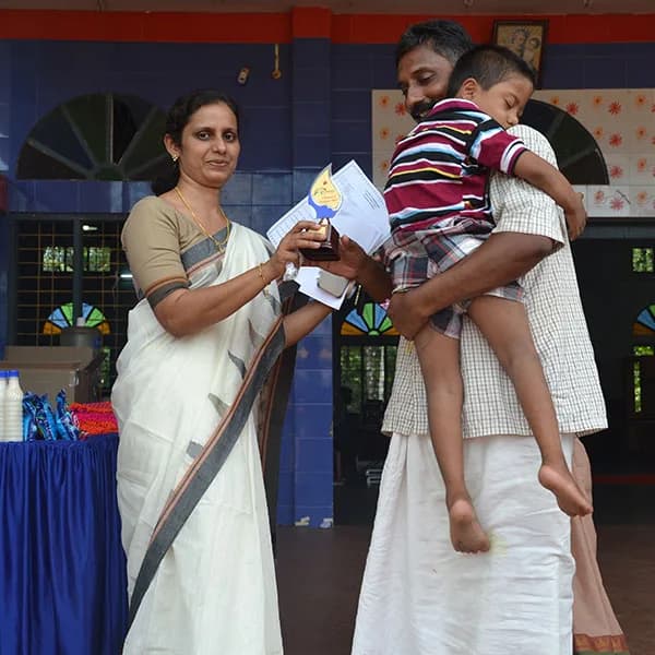 A child is presented with an award