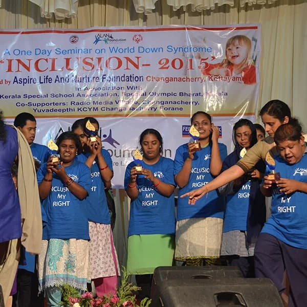 Children on stage with their awards